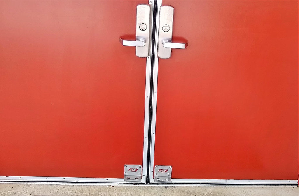 Tirador de pie para puerta